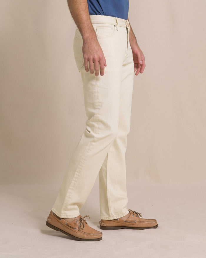 The side view of the Southern Tide King Street Denim Pant by Southern Tide - Ecru