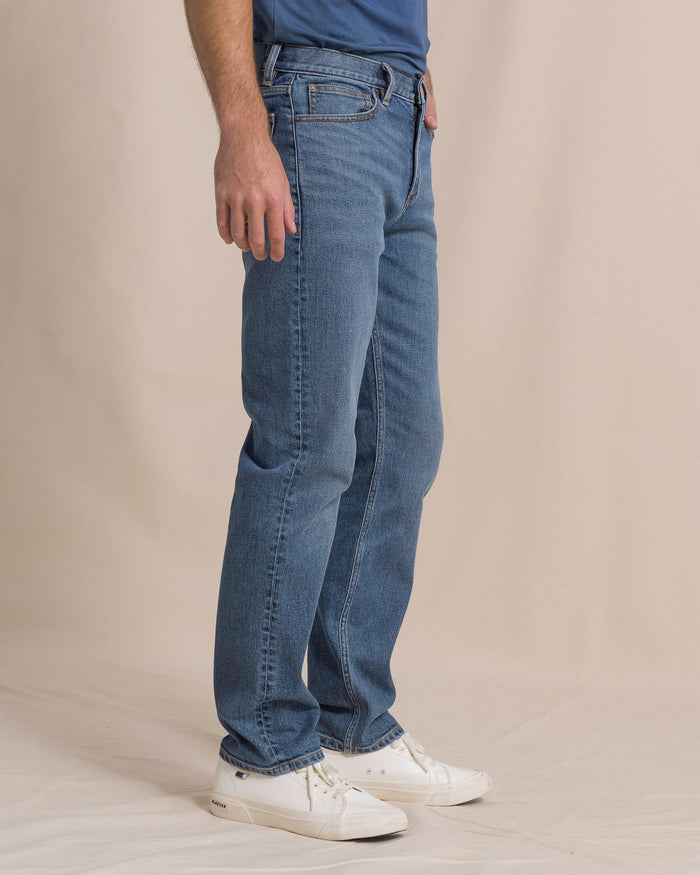 The side view of the Southern Tide King Street Denim Pant by Southern Tide - Medium Wash