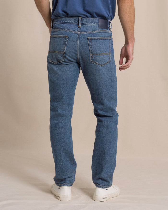 The back view of the Southern Tide King Street Denim Pant by Southern Tide - Medium Wash
