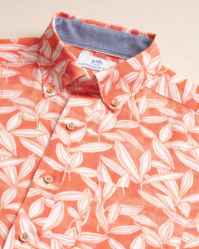 The detail view of the Southern Tide Kokomo Row Linen Rayon Short Sleeve Sport Shirt by Southern Tide - Orange Blossom