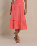 The front view of the Southern Tide Lydia Smocked Waist Midi Skirt by Southern Tide - Coral Beach