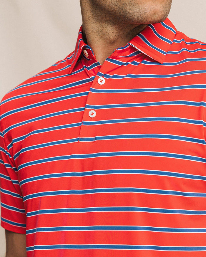 The detail view of the Southern Tide Moonlight Bay Stripe Coastal Breeze® Performance Polo by Southern Tide - Channel Marker Red