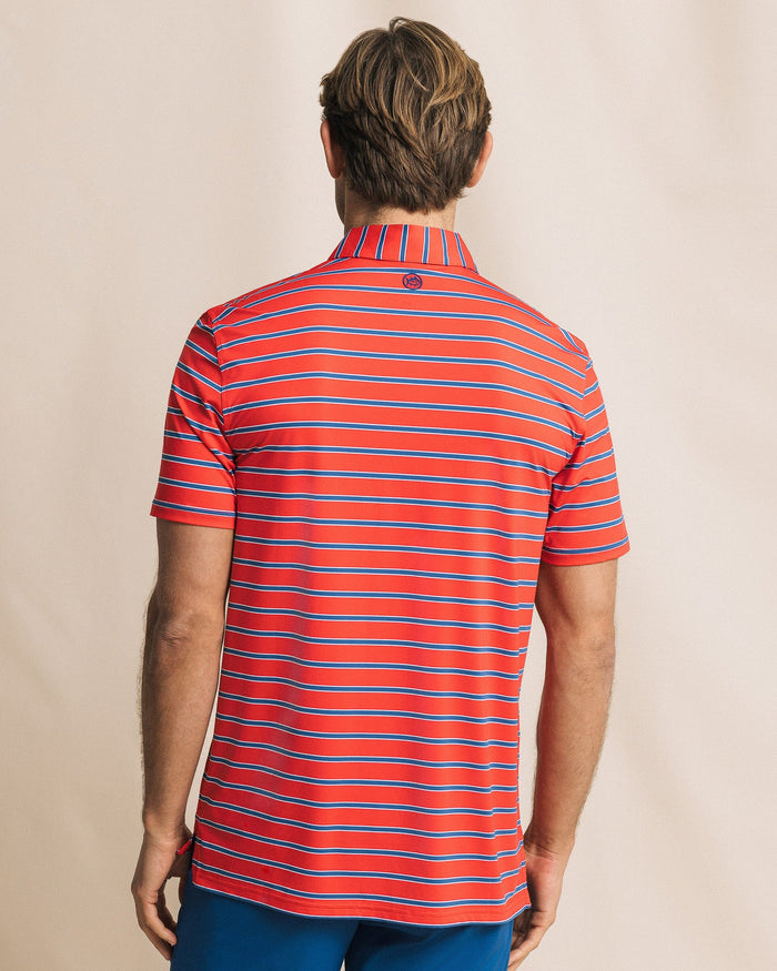 The back view of the Southern Tide Moonlight Bay Stripe Coastal Breeze® Performance Polo by Southern Tide - Channel Marker Red
