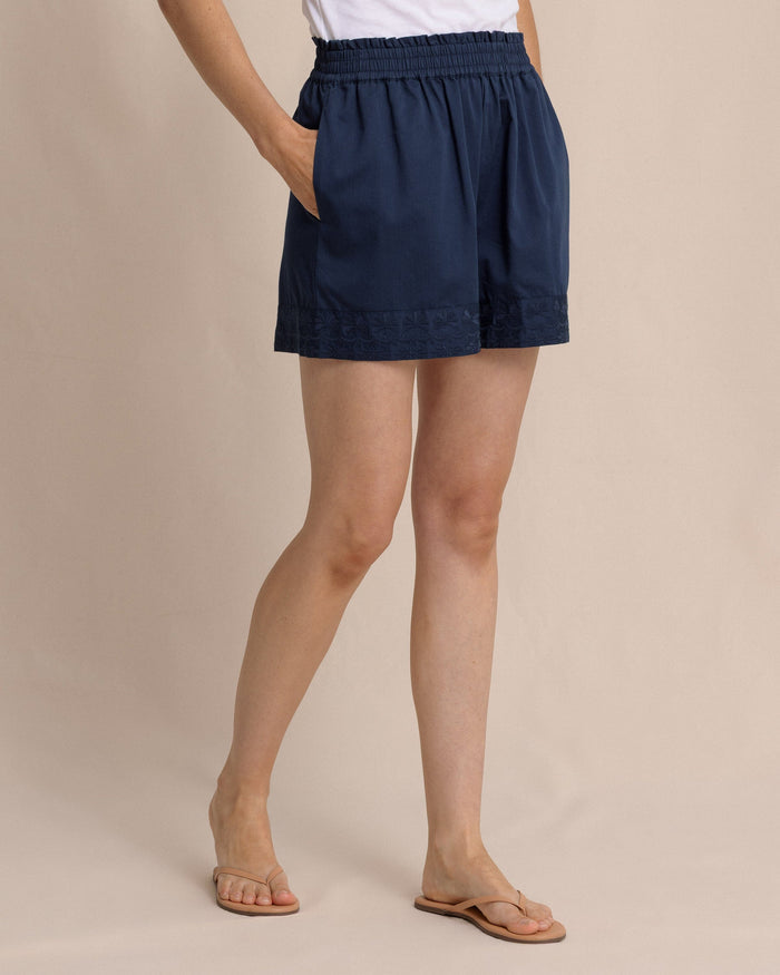The side view of the Southern Tide Nance Embroidered Shorts by Southern Tide - Dress Blue