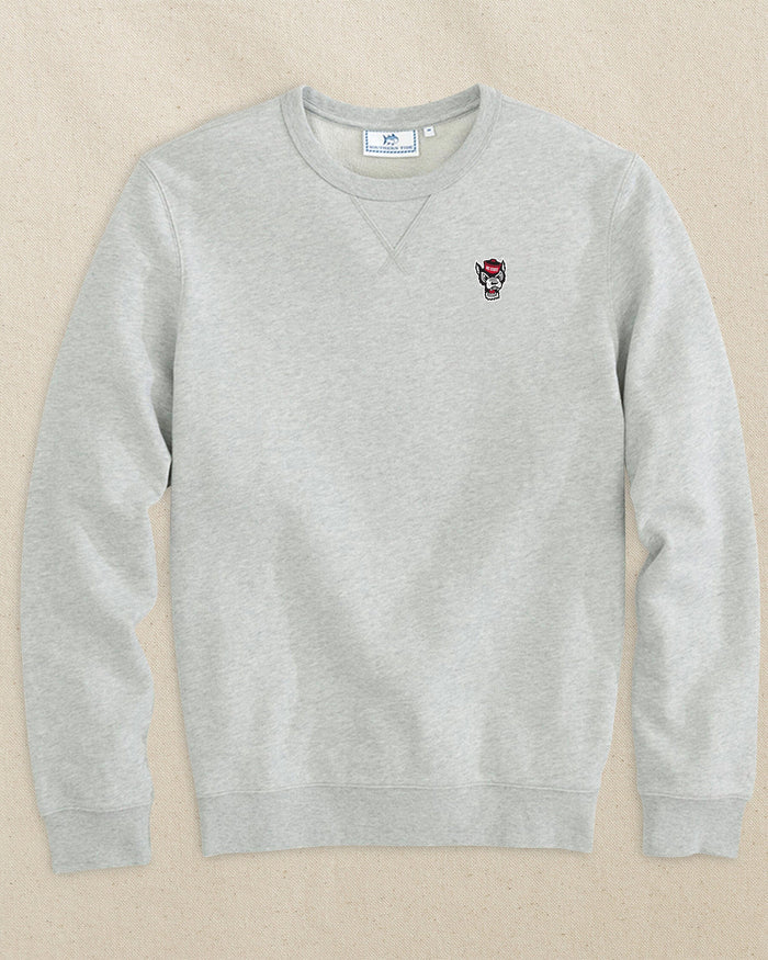 The front view of the Southern Tide NC State Wolf Head Upper Deck Pullover Sweatshirt by Southern Tide - Heather Slate Grey