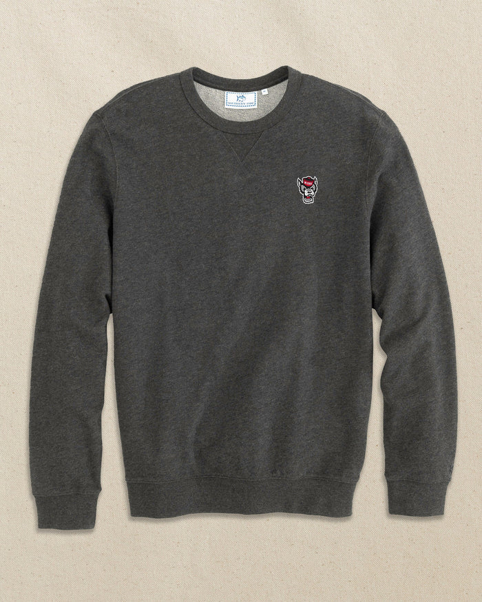 The front view of the Southern Tide NC State Wolf Head Upper Deck Pullover Sweatshirt by Southern Tide - Heather Black