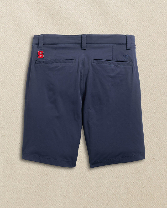 The back view of the Southern Tide NC State Wolfpack brrr°®-die 8" Performance Short by Southern Tide - True Navy