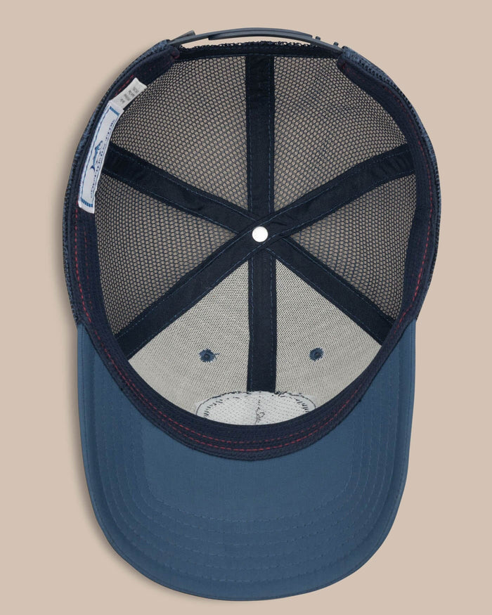 The below view of the Men's North Carolina Patch Performance Trucker Hat by Southern Tide - Seven Seas Blue