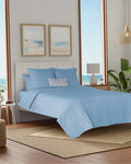 The side view of the Southern Tide Ocean Isle Peri Quilt by Southern Tide - Peri
