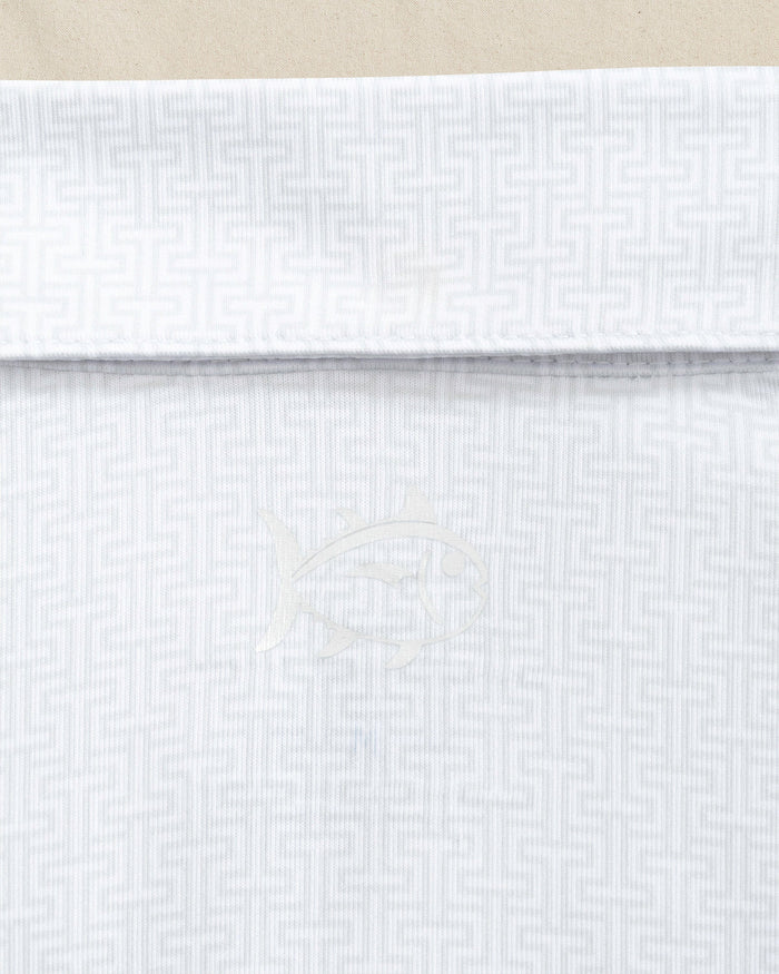 The detail view of the Southern Tide Ohio State Buckeyes Driver ST Geo Printed Polo by Southern Tide - Classic White