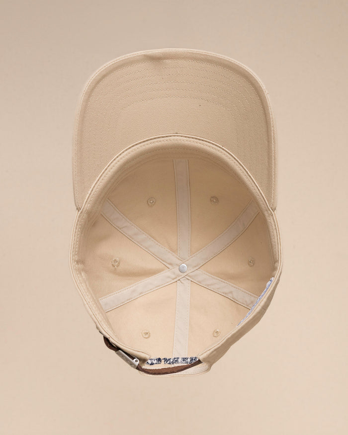 The inside view of the Southern Tide Outline Skipjack Leather Strap Hat by Southern Tide - Sand Dune