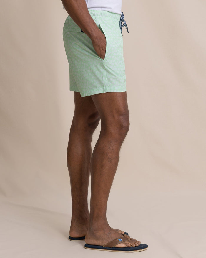 The side view of the Southern Tide Palmy Vibes Maritime Swim Trunk by Southern Tide - Green Ash