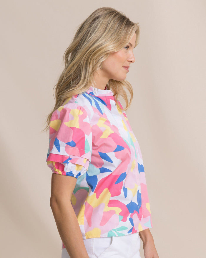 The side view of the Southern Tide Payge Floral Print Poplin Top by Southern Tide - Classic White