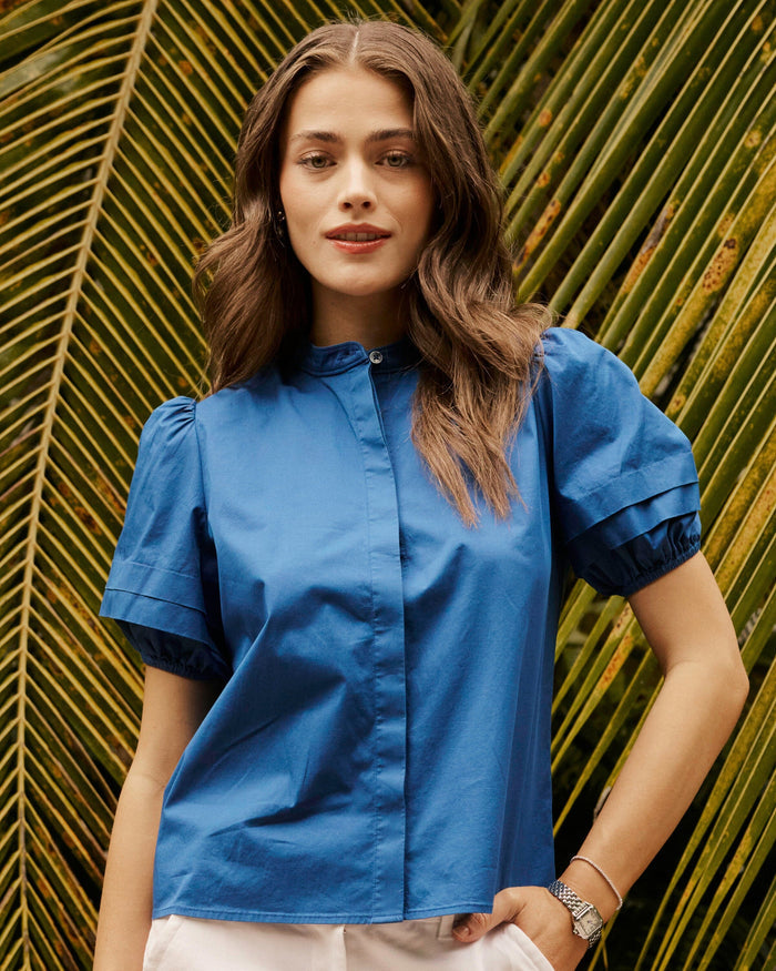 The lifestyle view of the Southern Tide Payge Solid Poplin Top by Southern Tide - Nautical Blue