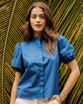 The lifestyle view of the Southern Tide Payge Solid Poplin Top by Southern Tide - Nautical Blue