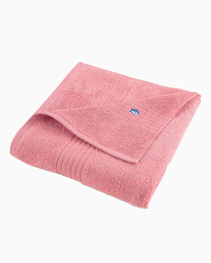 The front view of the Performance 5.0 Bath Towel by Southern Tide - Geranium Pink - Bath Towel