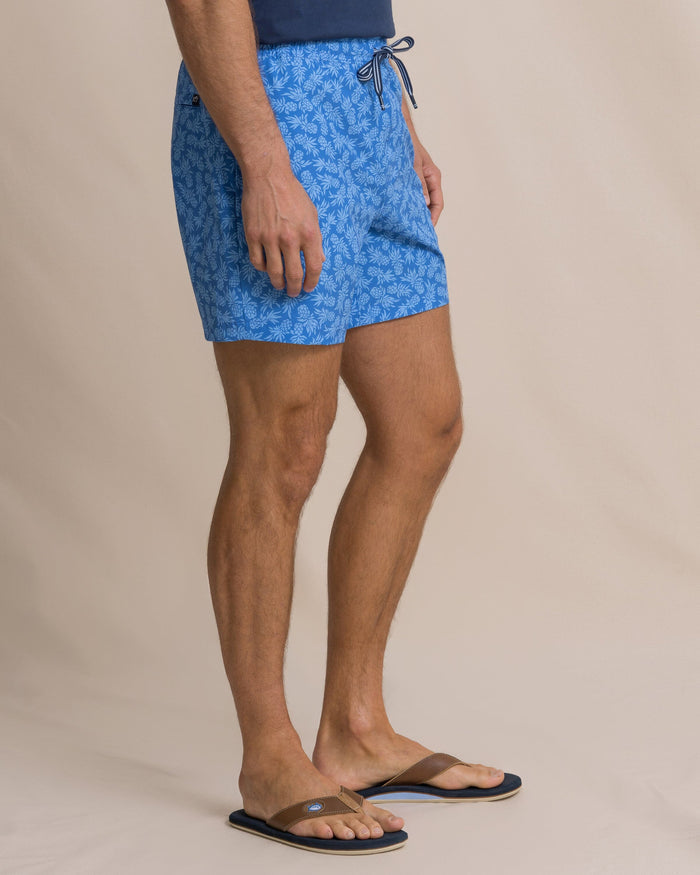 The side view of the Southern Tide Pineapple Parade Maritime Swim Trunk by Southern Tide - Blue Stream
