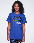 Female model wearing a blue Zumba t-shirt with 'DANCE' printed in black and 'Zumba' in white, paired with colorful leggings against a white background.