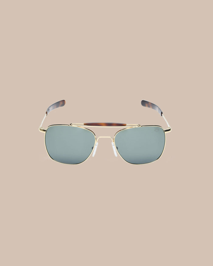 The front view of the Southern Tide Quarter Deck Aviator by Southern Tide - Yellow Gold Frame with American Green Lens