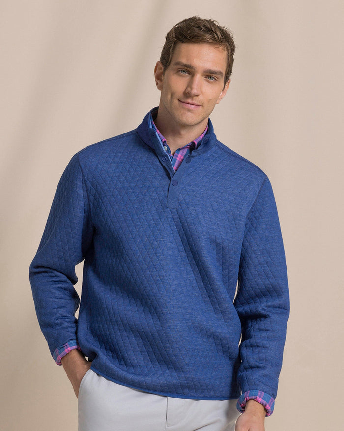 The front view of the Southern Tide Quilted Heather Reversible Quarter Snap by Southern Tide - Heather Ocean Channel