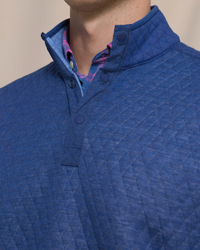 The detail view of the Southern Tide Quilted Heather Reversible Quarter Snap by Southern Tide - Heather Ocean Channel