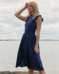 The lifestyle view of the Southern Tide Rebekah Eyelet Midi Dress by Southern Tide - Dress Blue