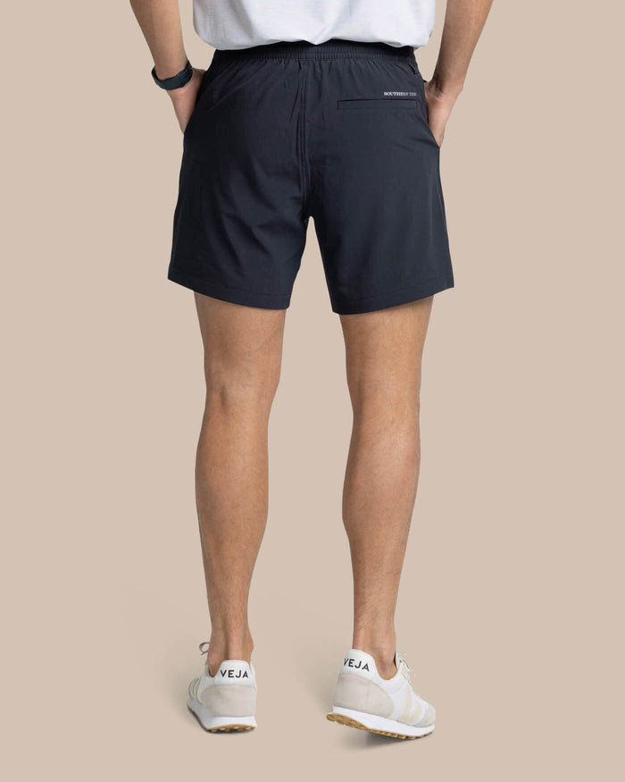The back view of the Southern Tide Rip Channel 6 Inch Performance Short by Southern Tide - Caviar Black