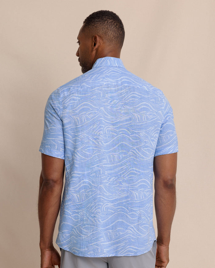 The back view of the Southern Tide Rolling Waves Linen Rayon Short Sleeve Sport Shirt by Southern Tide - Cerulean
