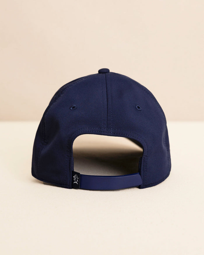 The back view of the Southern Tide Rubber Skipjack Patch Performance Hat by Southern Tide - Navy