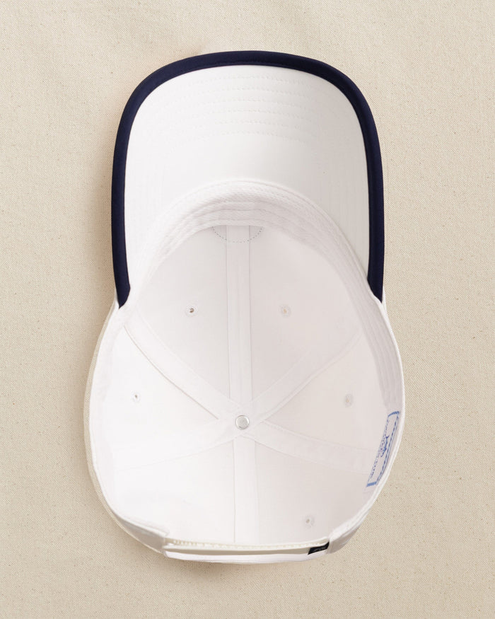 The detail view of the Southern Tide Rubber Skipjack Patch Performance Hat by Southern Tide - White