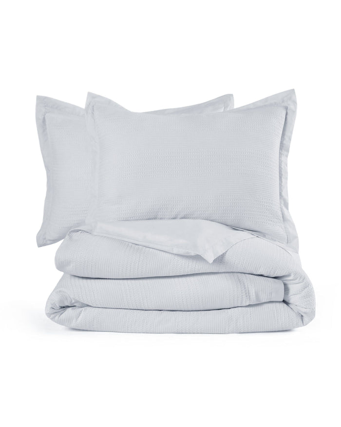 The front view of the Southern Tide Saltwater Comforter Set by Southern Tide - Grey