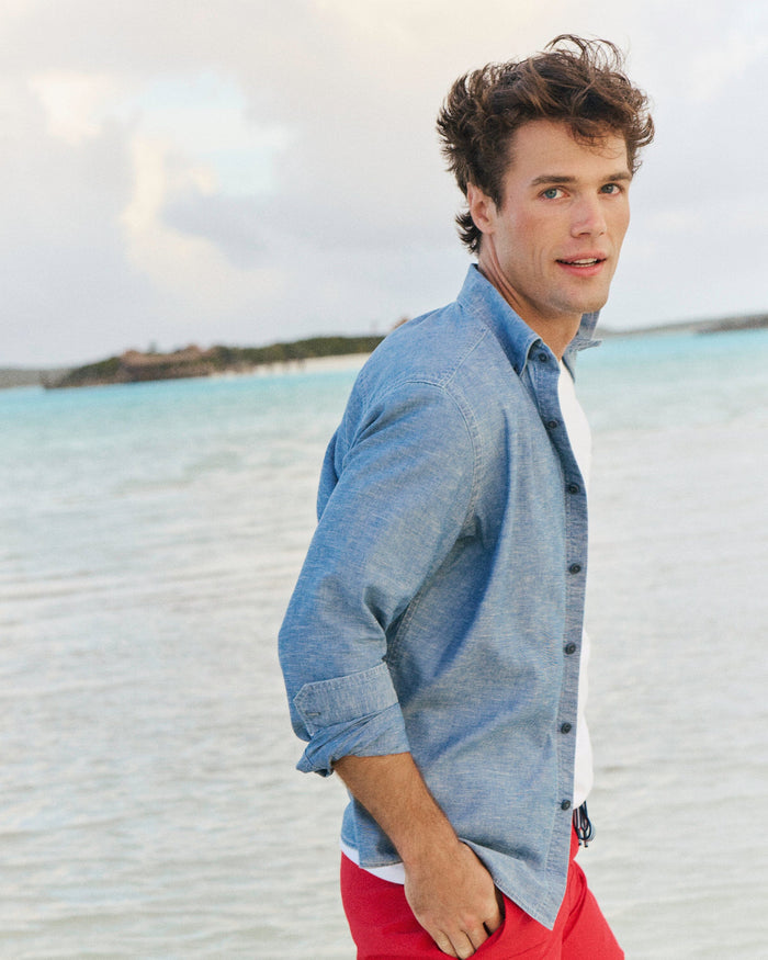 The lifestyle view of the Southern Tide Sandy Beach Chambray Sport Shirt by Southern Tide - Blue Chambray