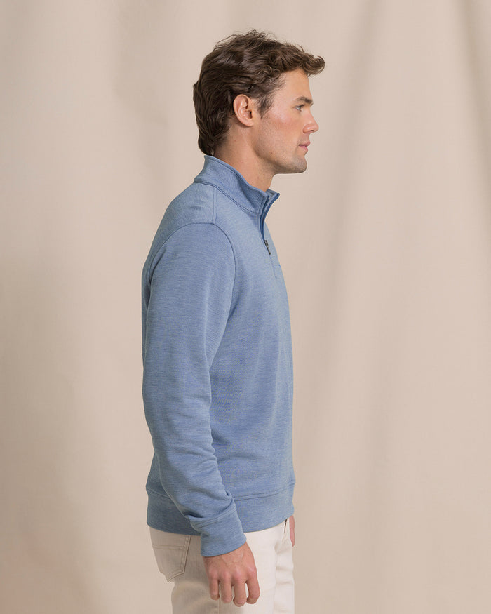 The side view of the Southern Tide Sandy Cove Pique Quarter Zip by Southern Tide - Nautical Blue