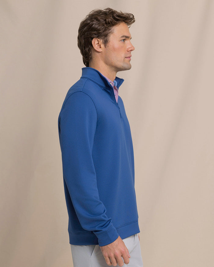 The side view of the Southern Tide Schooner Long Sleeve Quarter Zip by Southern Tide - Nautical Blue