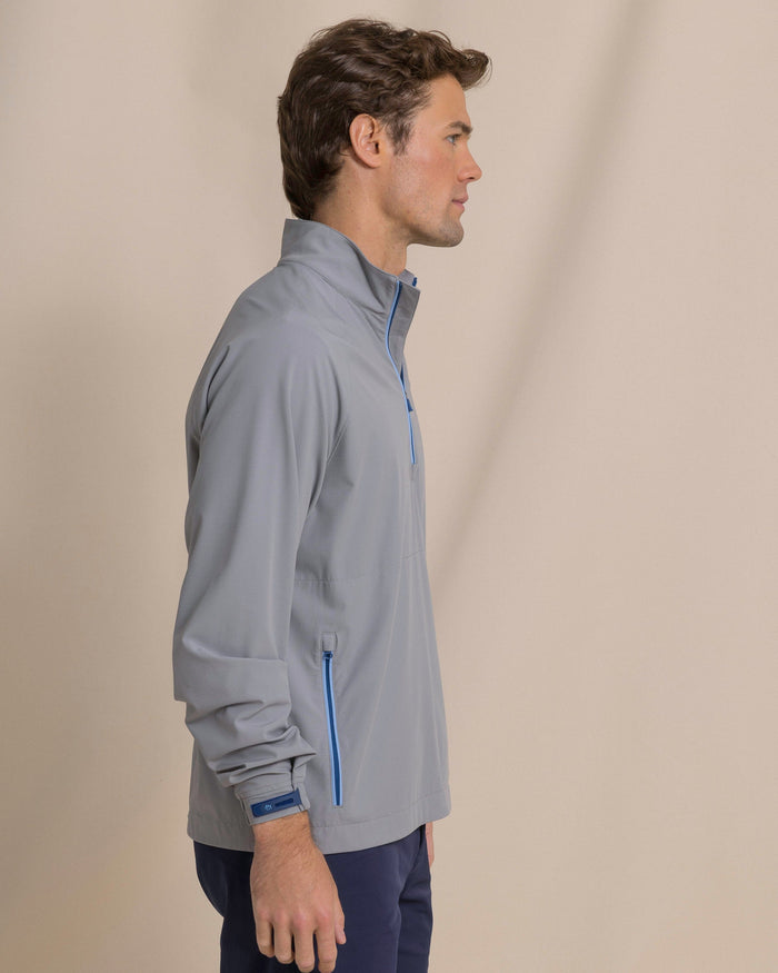 The side view of the Southern Tide Seabreeze Performance Pullover by Southern Tide - Steel Grey