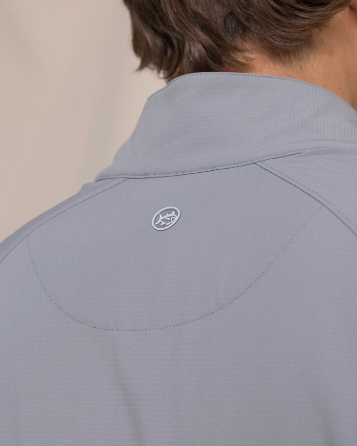 The detail view of the Southern Tide Seabreeze Performance Pullover by Southern Tide - Steel Grey