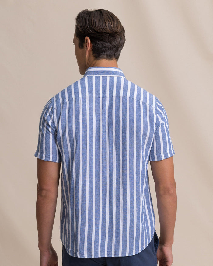 The back view of the Southern Tide Seamark Stripe Linen Rayon Short Sleeve Sport Shirt by Southern Tide - Nautical Blue