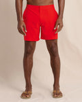 The front view of the Southern Tide Shelter Cove Swim Trunk by Southern Tide - Poppy Red