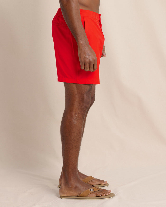 The side view of the Southern Tide Shelter Cove Swim Trunk by Southern Tide - Poppy Red