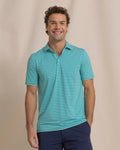 The front view of the Southern Tide Shipwatch Stripe Coastal Breeze® Performance Polo by Southern Tide - Persian Green