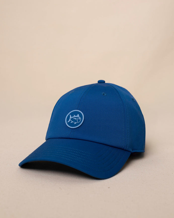 The side view of the Southern Tide Skipjack Circle Performance Hat by Southern Tide - Nautical Blue