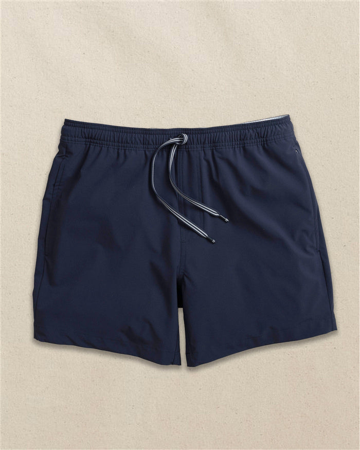 The front view of the Southern Tide Solid Maritime Swim Trunk by Southern Tide - Dress Blue