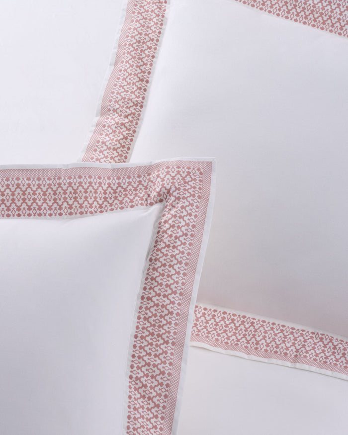 The front view of the Southern Tide Southern Tide Augustine Comforter Set by Southern Tide - White/Pink