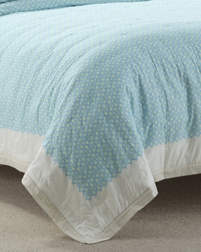 The front view of the Southern Tide Southern Tide Bellweather Quilt by Southern Tide - Multi