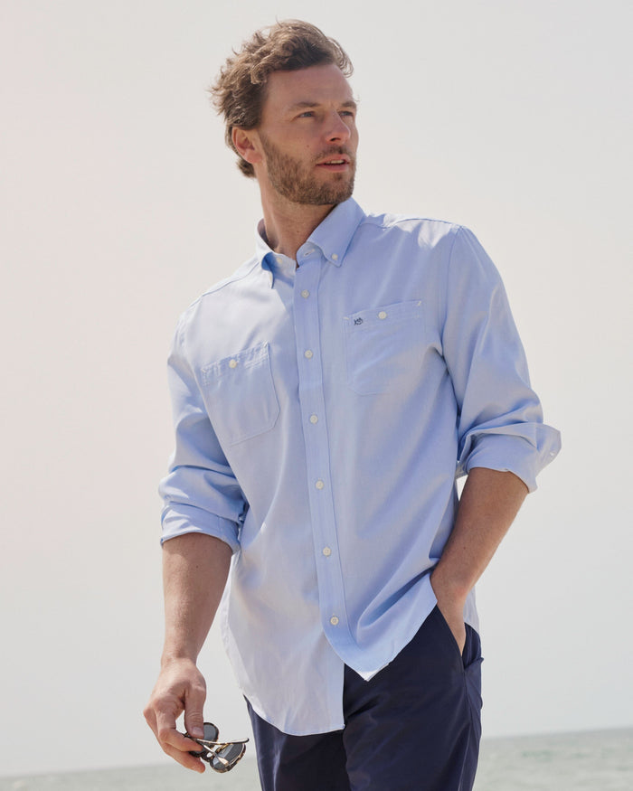 The lifestyle view of the Southern Tide Dock Shirt by Southern Tide - Cerulean