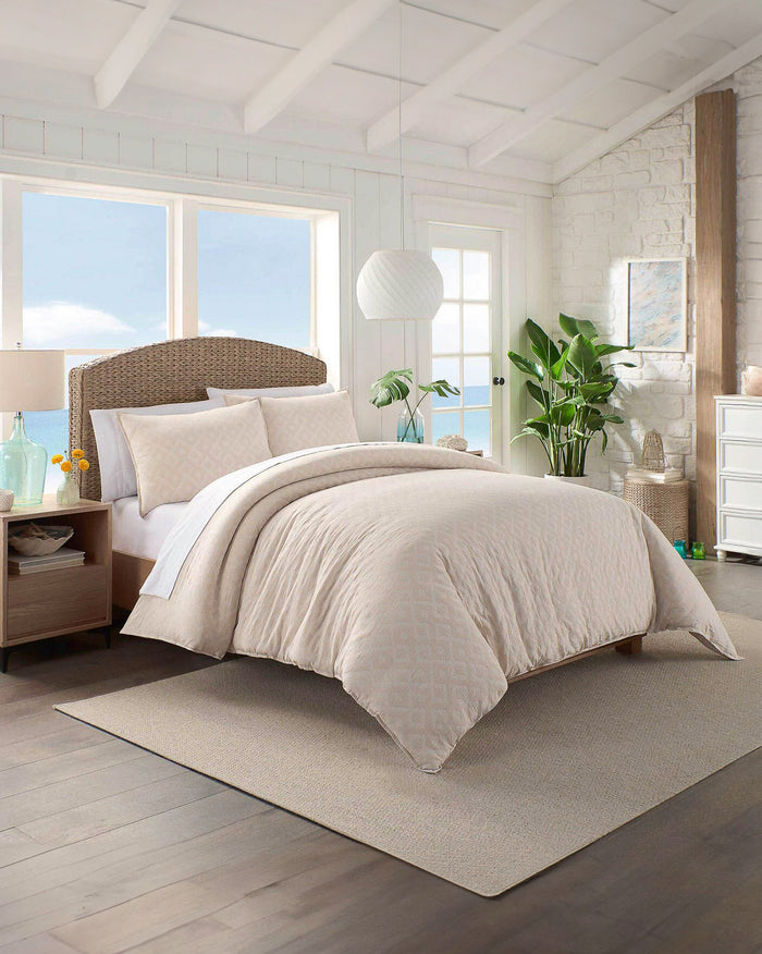 The lifestyle view of the Southern Tide Pawley's Island Tan Comforter Set by Southern Tide - Tan