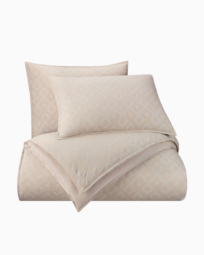 The front pillows view of the Southern Tide Pawley's Island Tan Comforter Set by Southern Tide - Tan