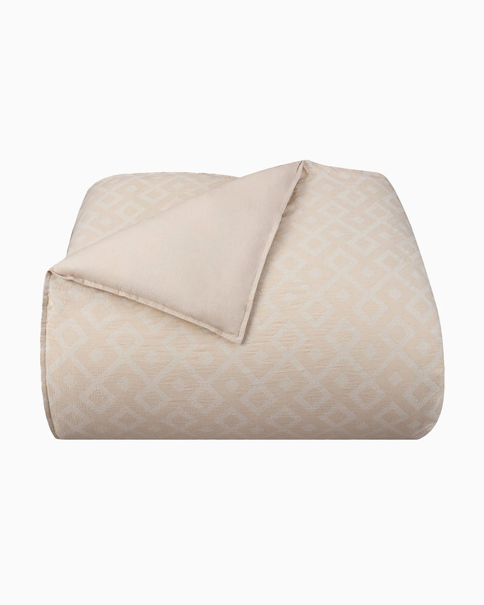 The front view of the Southern Tide Pawley's Island Tan Comforter Set by Southern Tide - Tan
