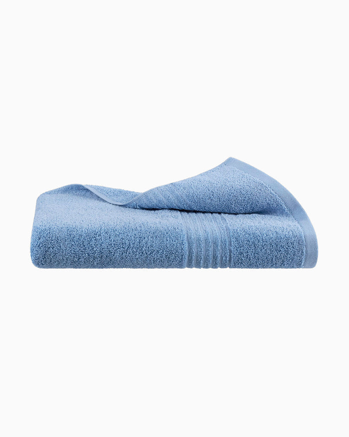 The front view of the Southern Tide Performance Oversized Bath Towel by Southern Tide - Little Boy Blue