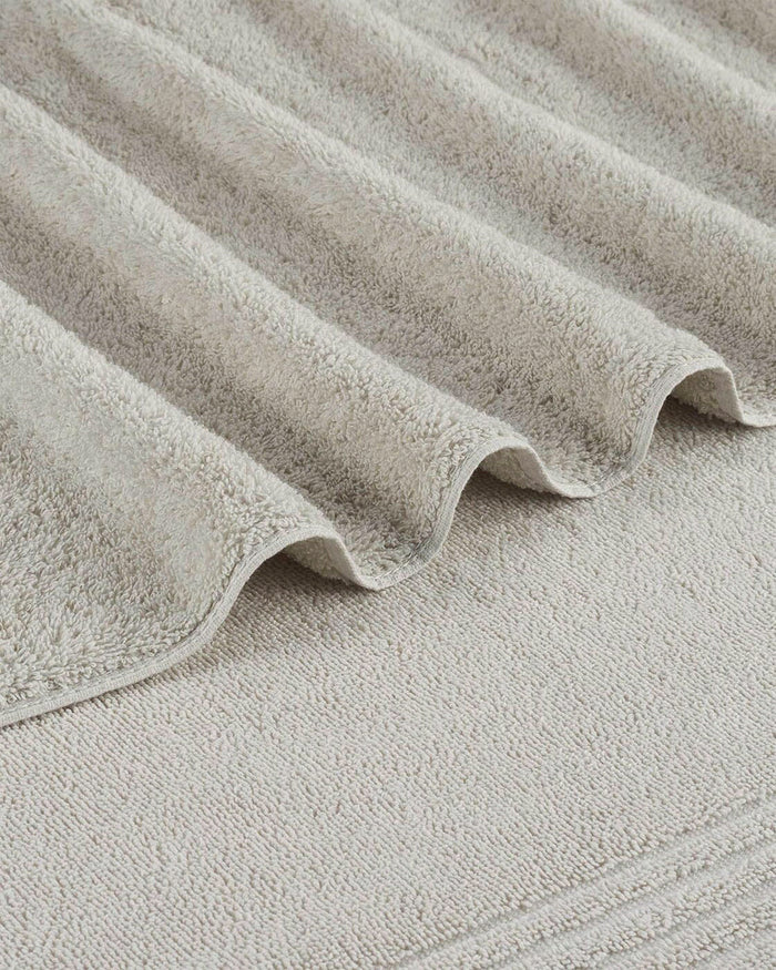 The detail view of the Southern Tide Performance Oversized Bath Towel by Southern Tide - Harpoon Grey